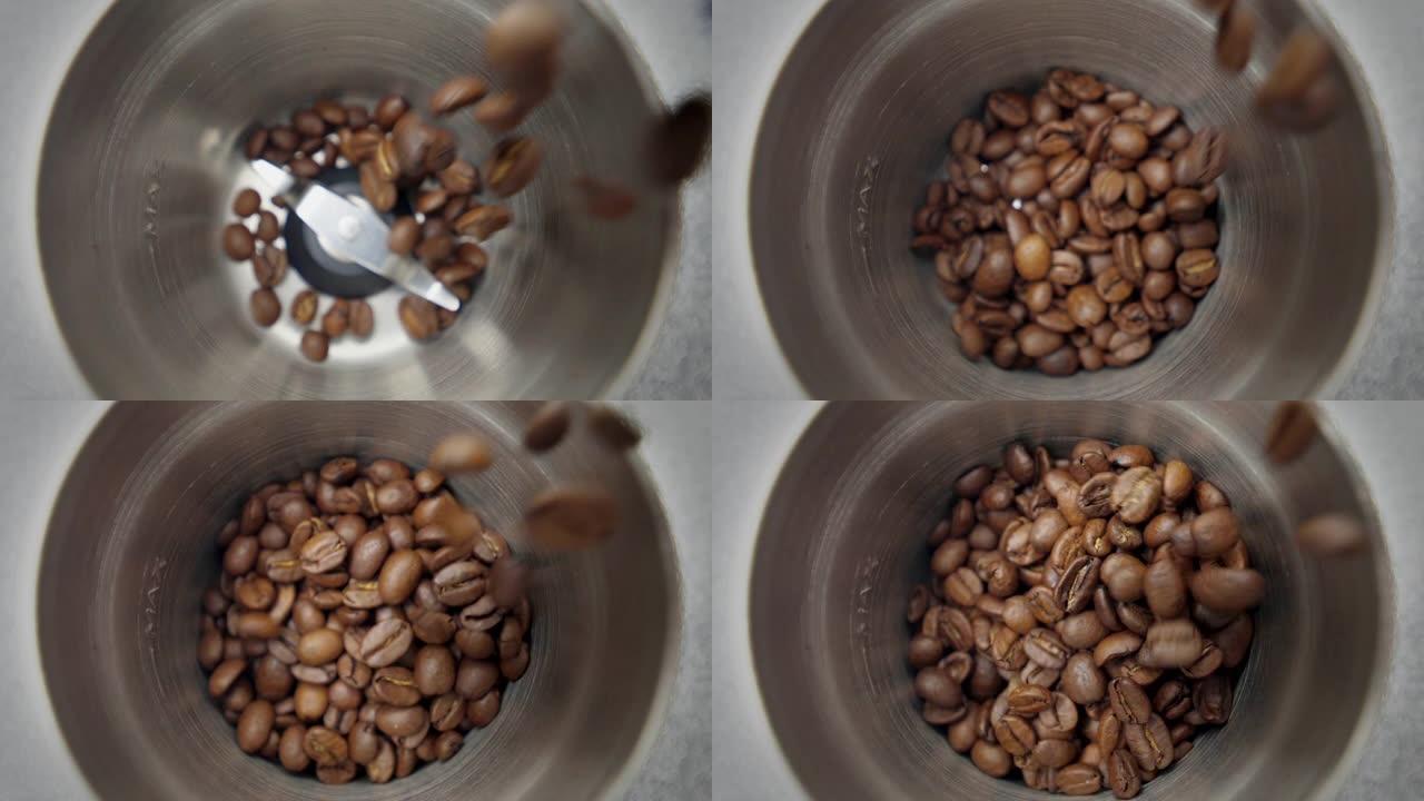 烤咖啡豆倒入咖啡研磨机。特写。