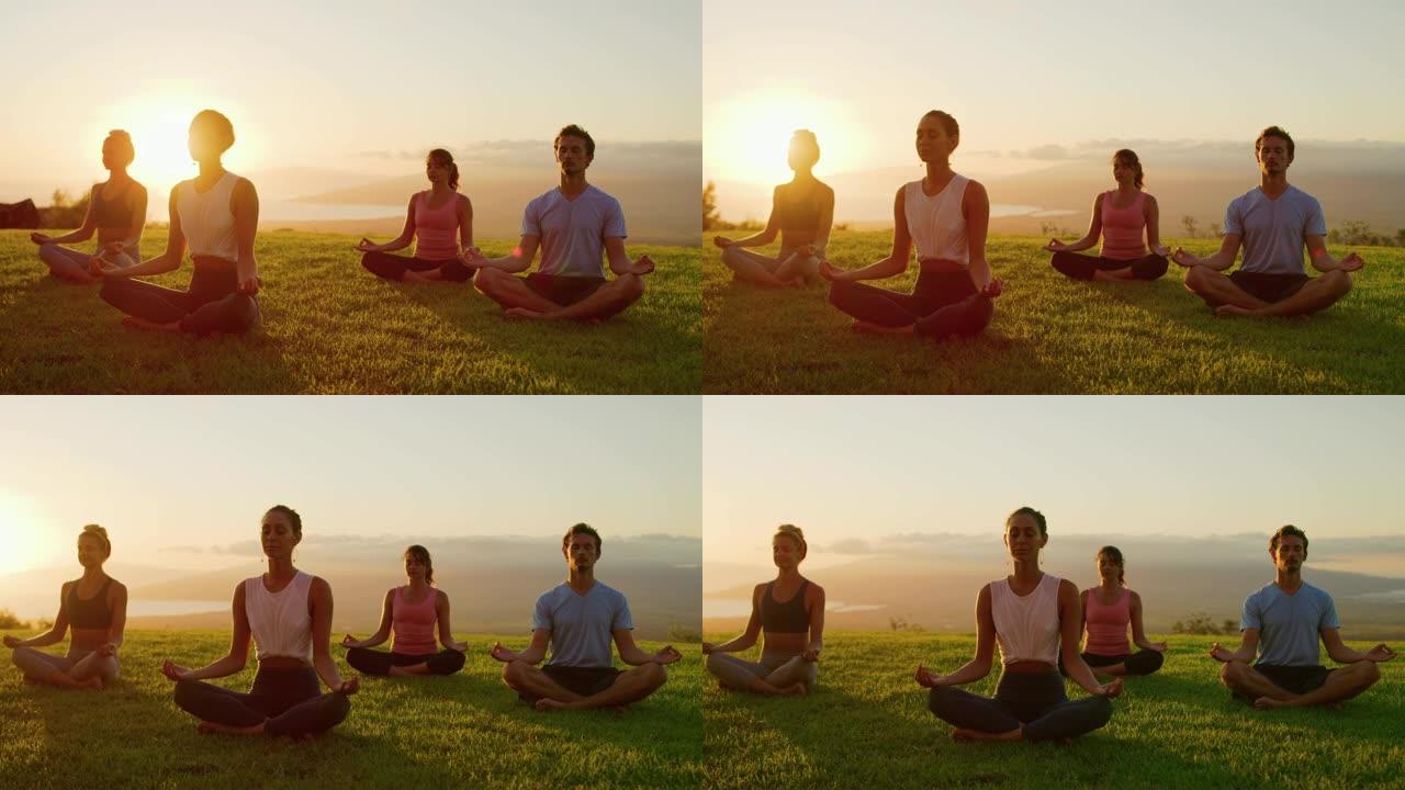 幸福是夕阳冥想一群人在山顶练瑜伽瑜伽练习