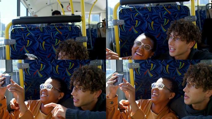 在4k公交车上旅行时，情侣用手机点击照片