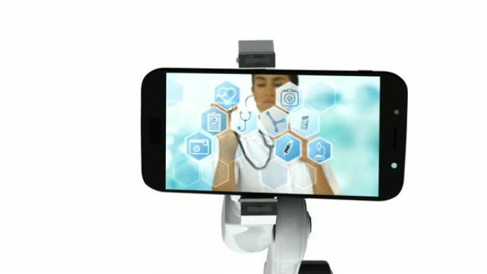 数字生成的白色机械臂拿着手机的视频，在屏幕上显示医疗图标
