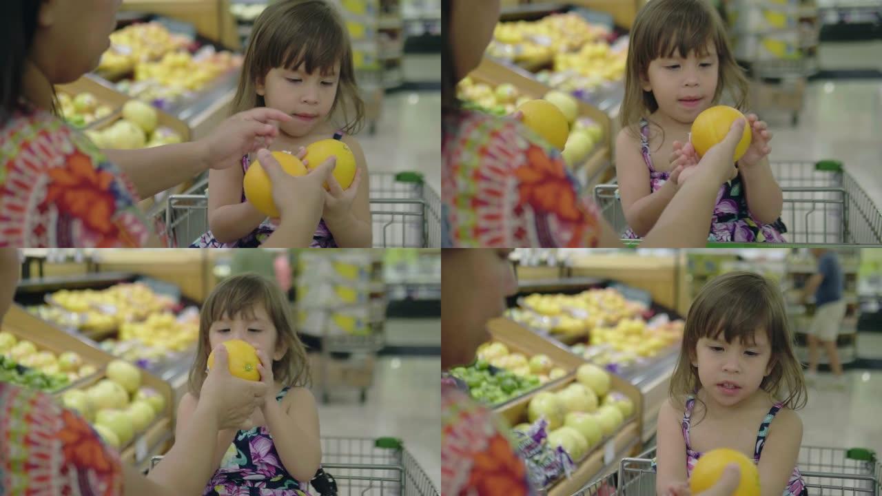 亚洲母女买蔬果摊母女买水果生鲜超市菜市场