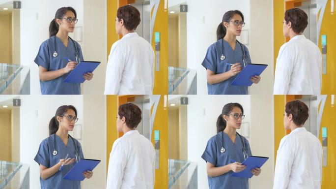 女医生咨询病例走廊交流病患处理两个女人