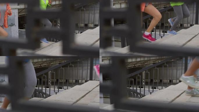 多种族女性慢跑者在楼梯上奔跑