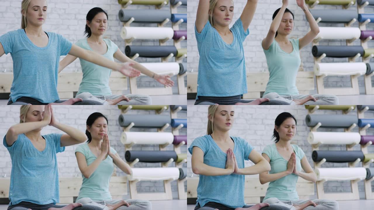 两个女人一起做瑜伽