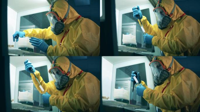 抗体研究cocnept，新型冠状病毒肺炎冠状病毒大流行。一个穿着危险品套装的人正在做化学研究