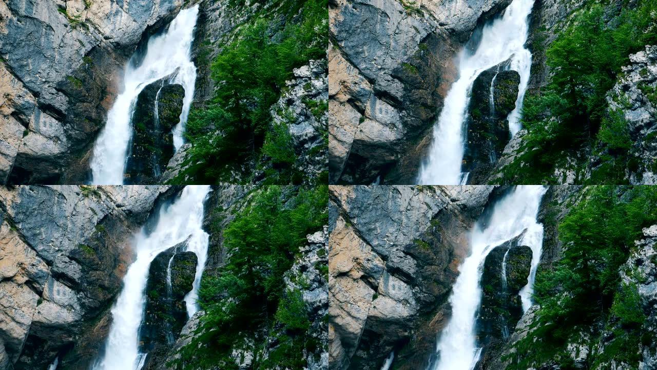 山里的自然瀑布。山中高大的瀑布正在流下来。