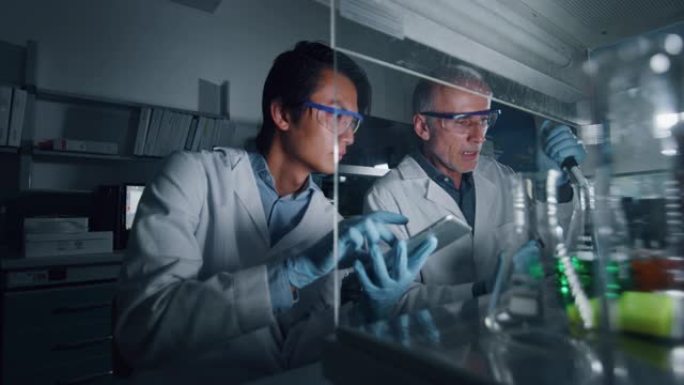 两名男性科学家的肖像正在对试管中的DNA和分子进行分析，并在实验室中显示出结果