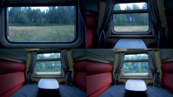 通过火车教练的窗户显示的森林景观。铁路旅行概念。