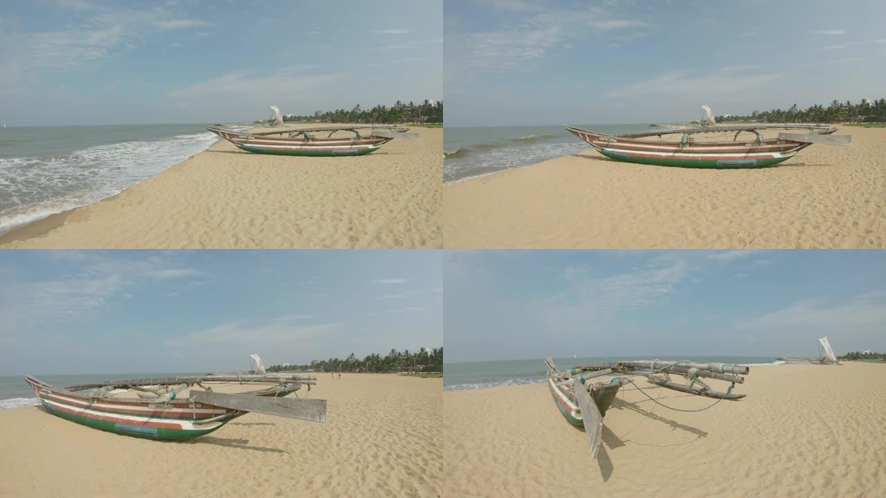 斯里兰卡阳光明媚的沙滩上的支腿独木舟女士