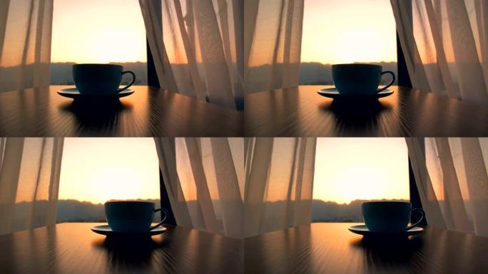 在日出背景下桌上的咖啡杯