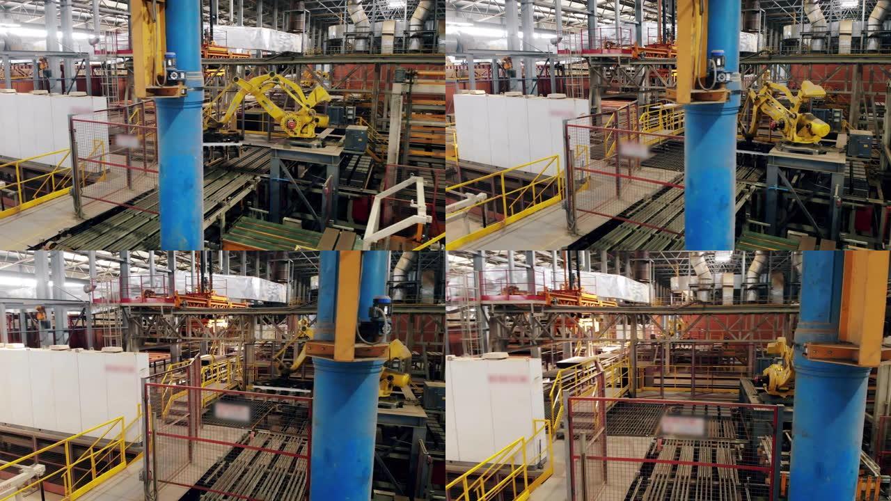 机器人化的自动化工业机器正在工厂运送砖块