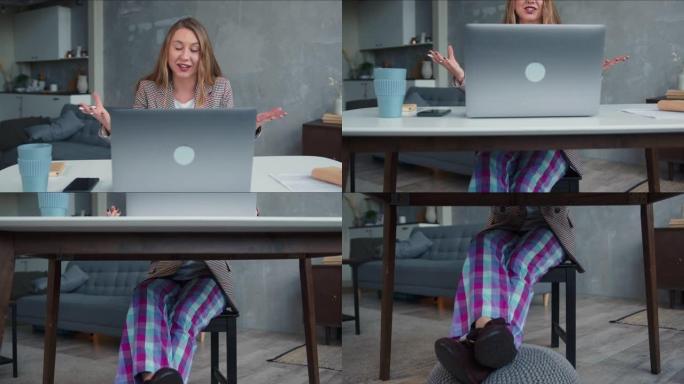 在家工作。年轻自信美丽的金发女商人穿着睡衣裤使用笔记本电脑网络电话会议。