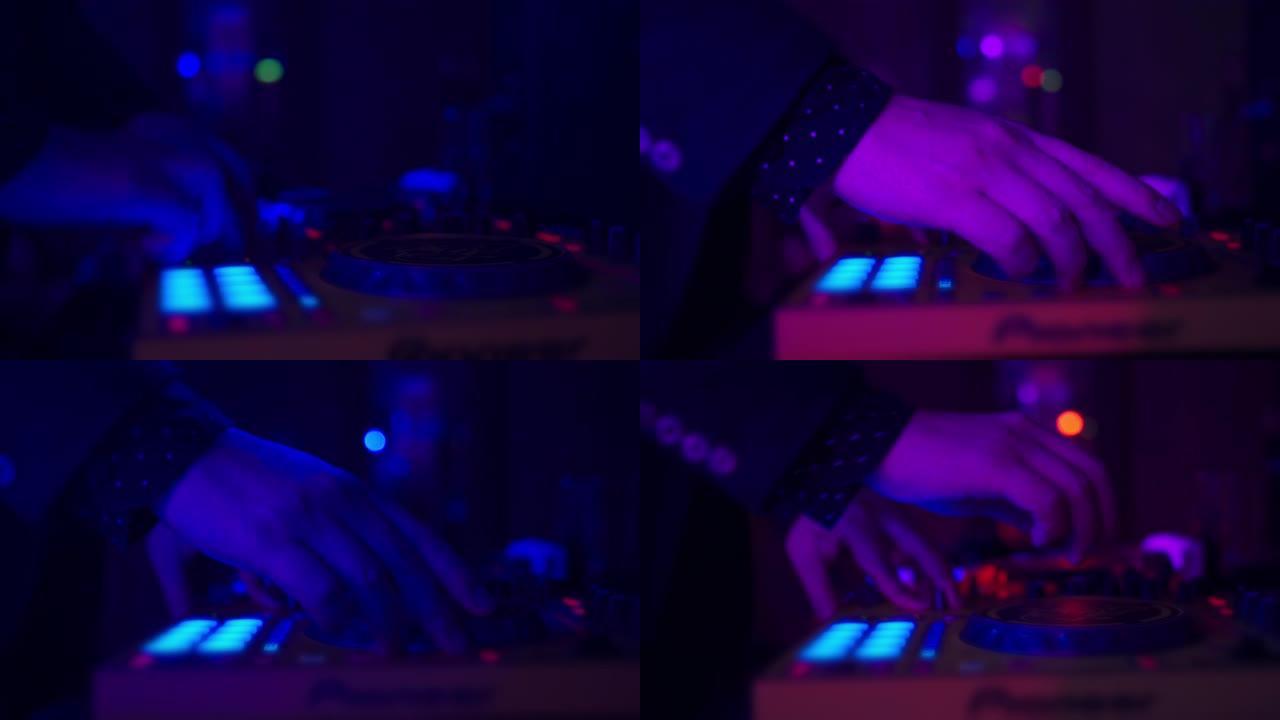 在发光的灯光下仍未使用的DJ混音器。