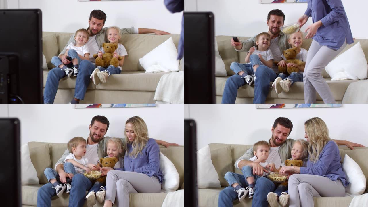 父母和孩子看电视幸福时光一家亲儿女双全