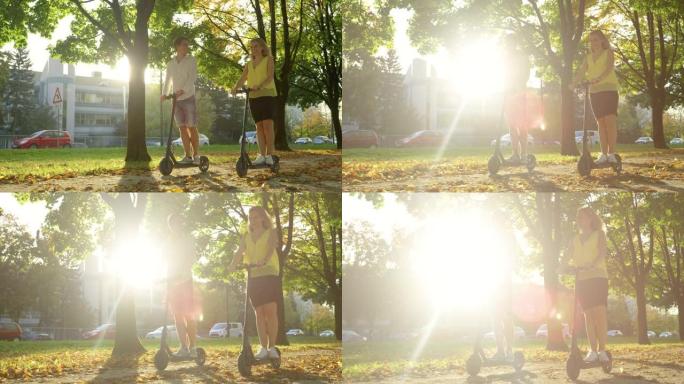 低角度: 金色阳光照耀着情侣乘坐电动踏板车的电影拍摄