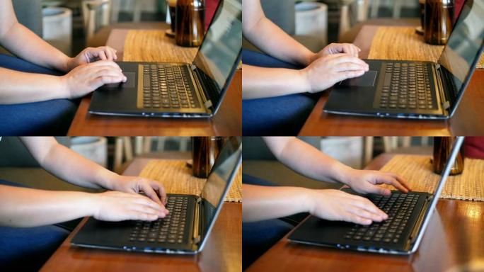 女人手在笔记本电脑键盘上打字，滑块向右移动，慢动作