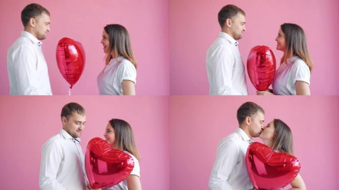 帅哥在情人节给表达爱情的女孩送心形气球