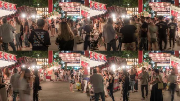 延时: 在日本神户跳蚤市场举行的夏季节日祭中，行人拥挤