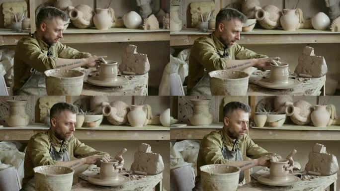 工匠湿手扔花瓶手工艺人陶瓷制作过程