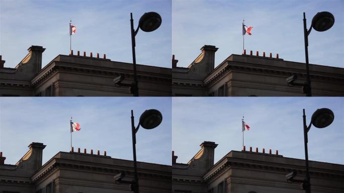 法国国旗在巴黎的一座建筑上自豪地挥舞着。