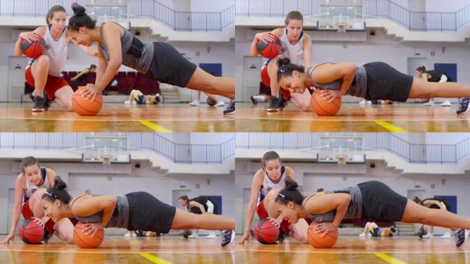 非洲女运动员在女教练的控制下与篮球一起锻炼
