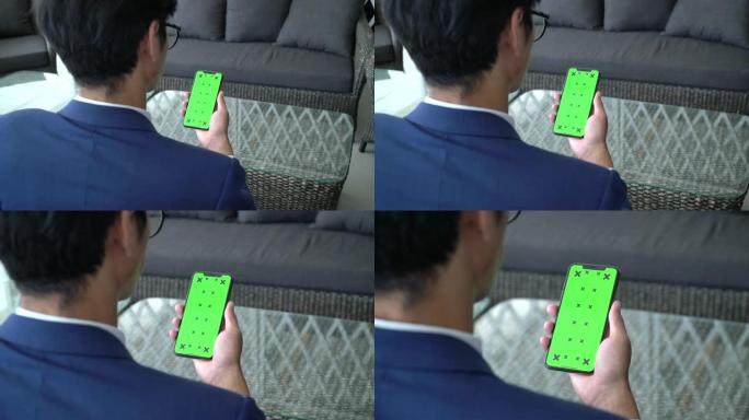 商人使用移动绿屏商人使用移动绿屏手机