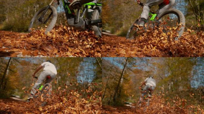 当男子骑着自行车沿着砾石小径行驶时，低角度落下的彩色叶子在空中飞舞