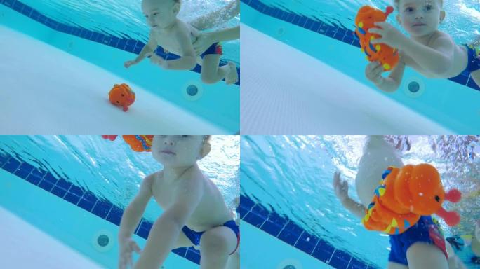 一个男孩在水下游泳，在水下抓住一个玩具，特写镜头。