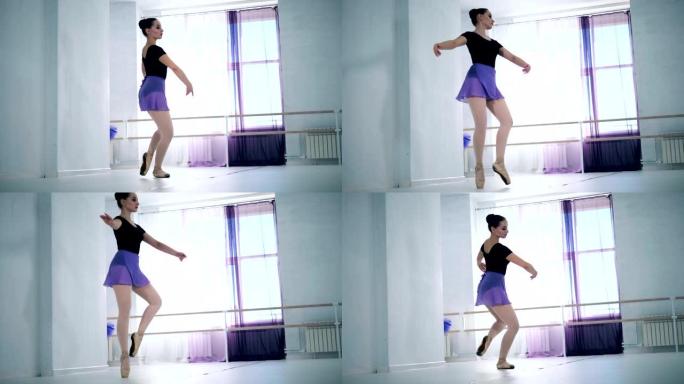 Lady dancer正在工作室练习芭蕾舞姿势