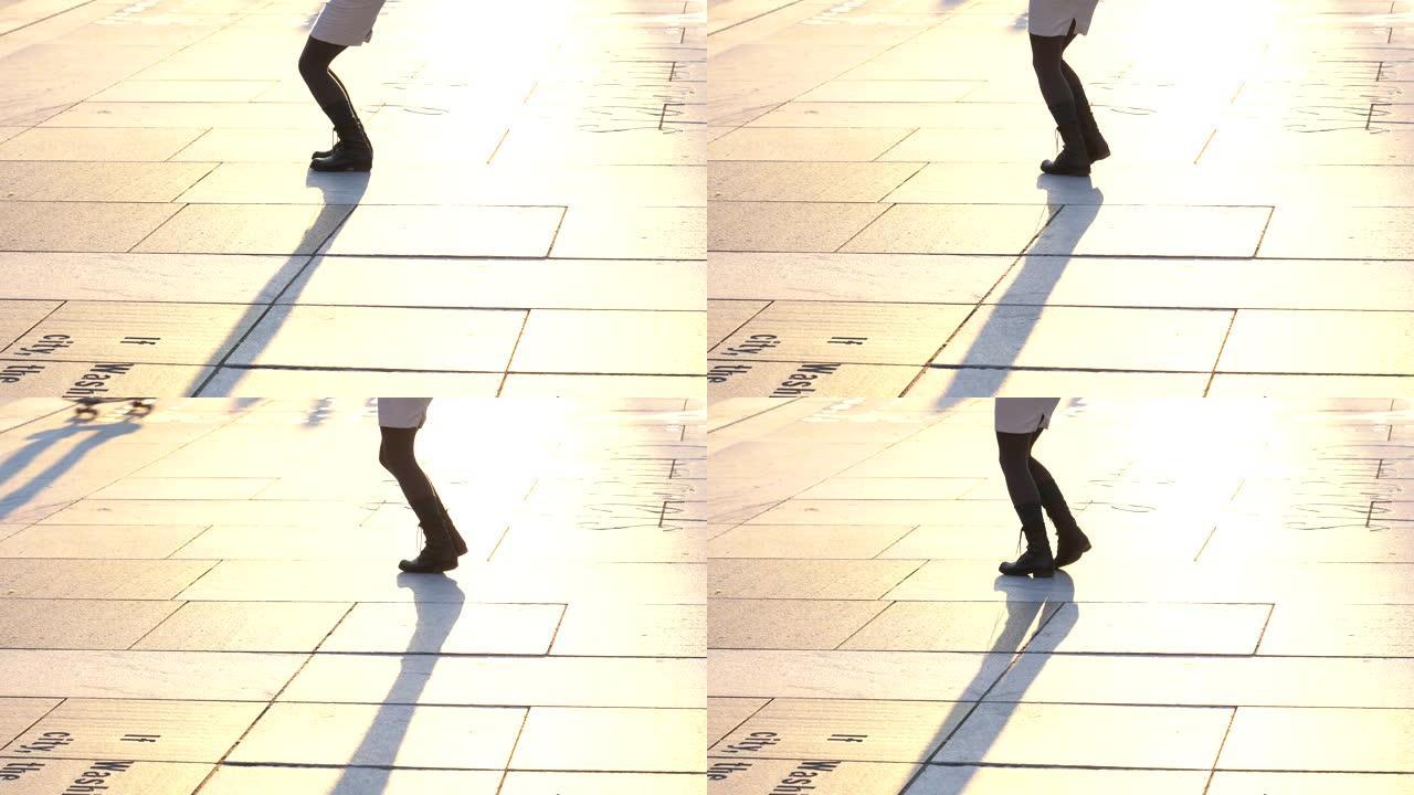 4k镜头场景特写镜头在美国华盛顿特区宾夕法尼亚州自由广场的女人跳舞的脚步，美国风格和音乐传统概念
