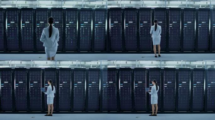 女性数据中心it技术人员带着笔记本电脑走过服务器机架走廊。她正在目视检查工作服务器机柜。
