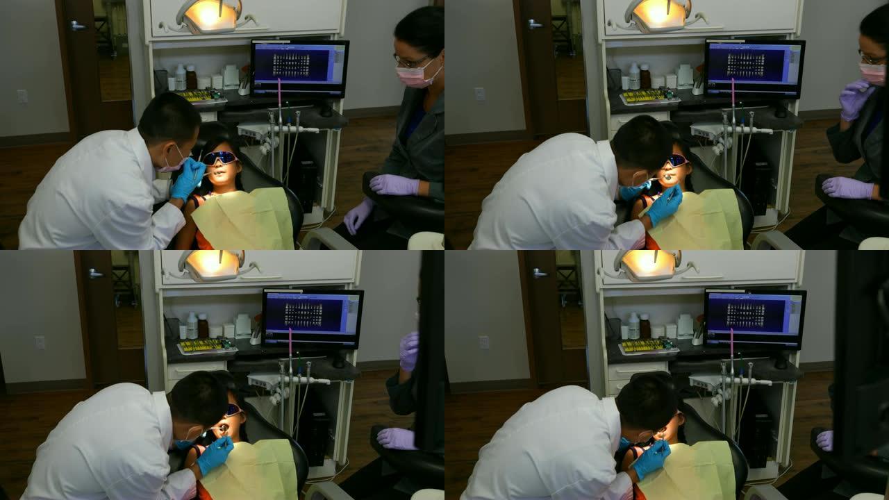 男性牙医用工具检查病人4k