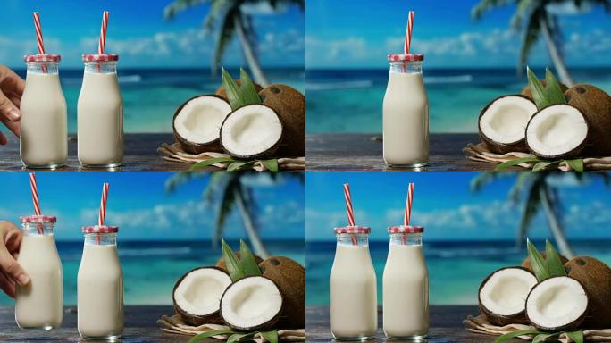 美味的新鲜营养椰子奶昔在白色墙壁的背景。