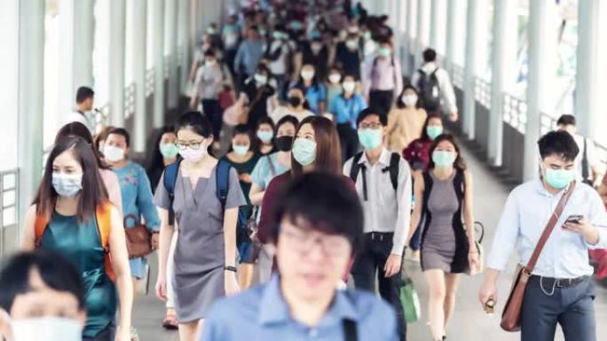 戴着口罩的亚洲妇女的时间流逝，以防止拥挤的人群中冠状病毒或新型冠状病毒肺炎爆发