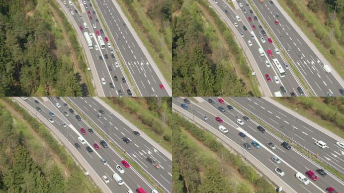 无人机: 在高速公路上的交通拥堵期间，在沿着入口车道行驶的汽车上方飞行