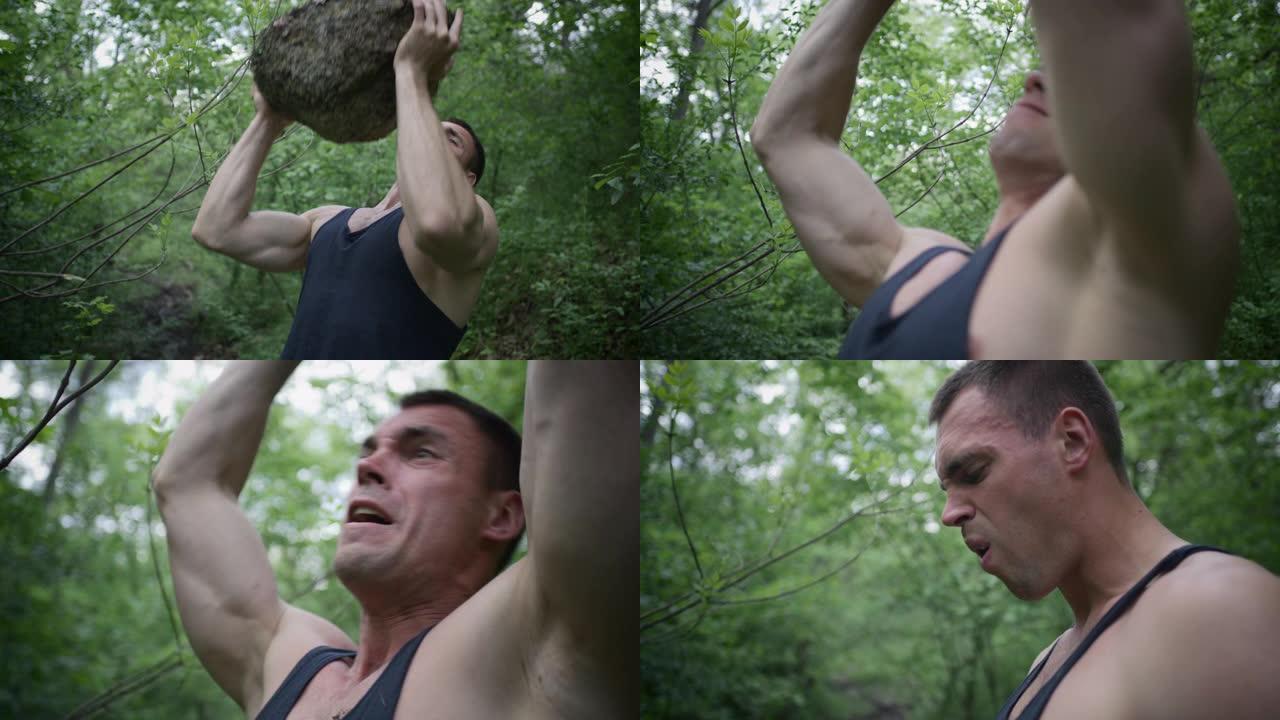 运动男子与岩石一起锻炼