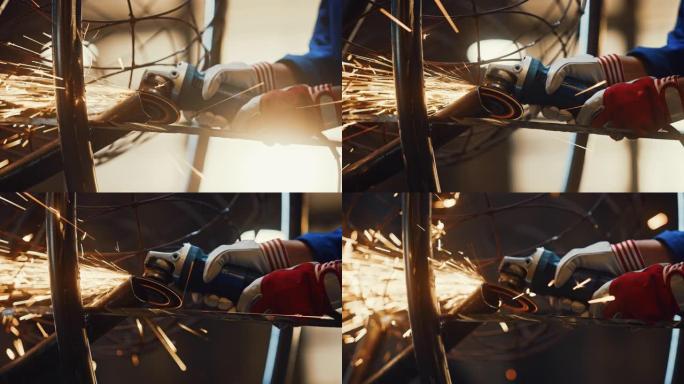 在工作室里，戴着安全手套并用角磨机打磨钢管雕塑的金属制造商的双手。在车间使用手持电动工具。