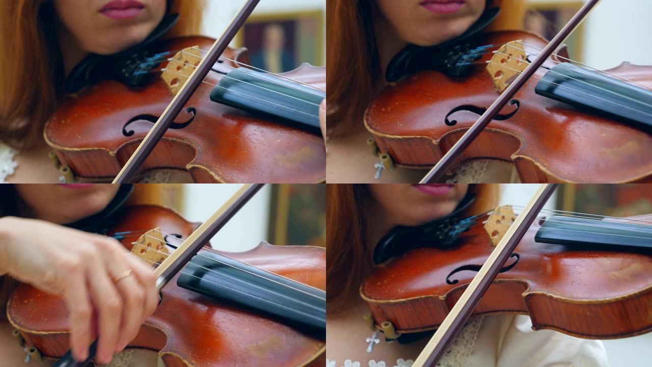 提琴手将小提琴放在肩膀上，在博物馆里演奏。