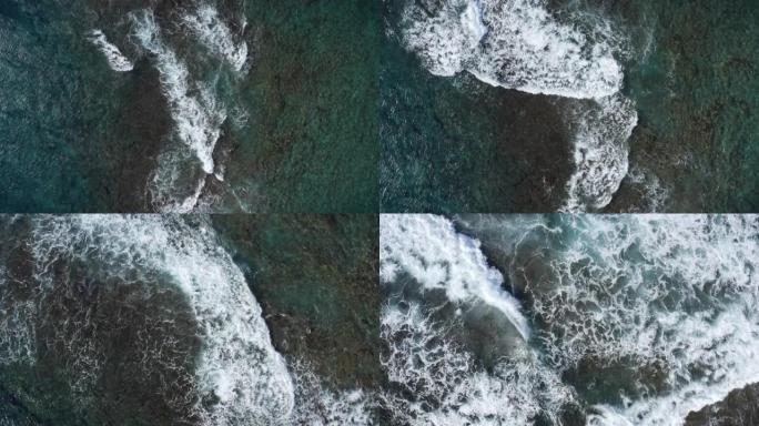 自上而下的海浪撞击热带珊瑚礁的抽象鸟瞰图