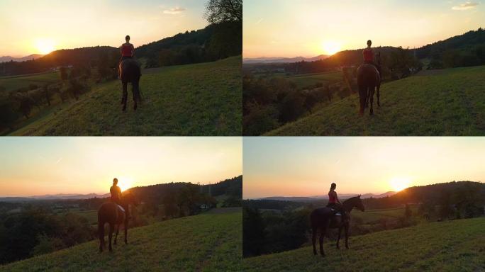 镜头耀斑: 骑马女孩看着田园诗般的夜晚乡村。