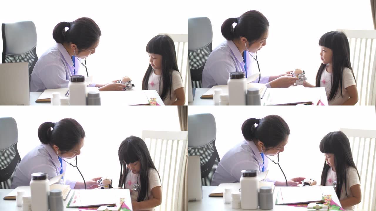 儿科医生在医院与小女孩交谈