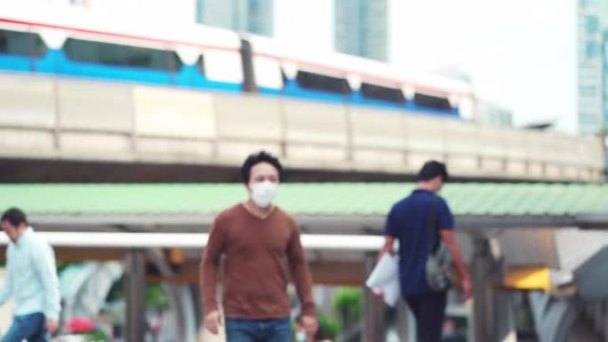 亚洲男子咳嗽戴口罩预防冠状病毒或新型冠状病毒肺炎爆发