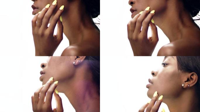 诱人的非洲民族妇女面对皮肤护理。平滑皮肤