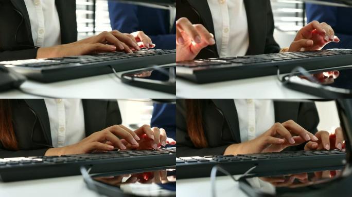 商务人士在办公室用键盘打字