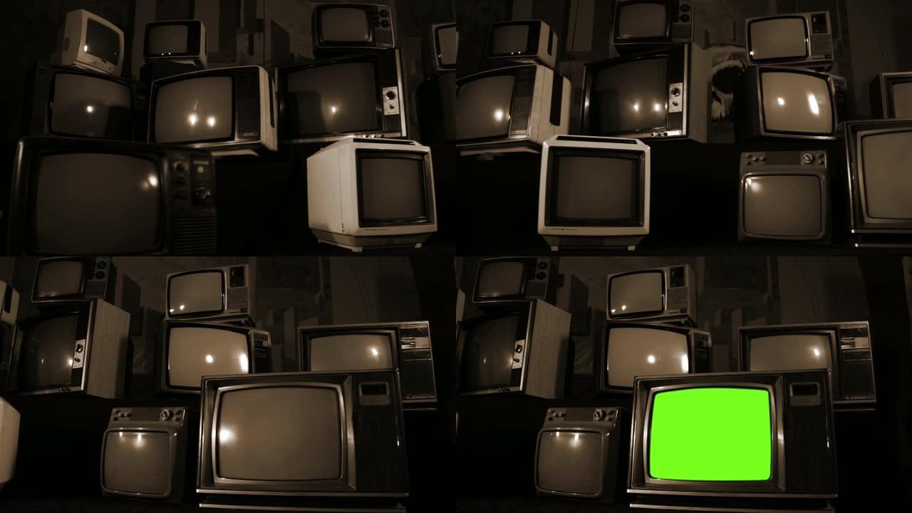 复古电视在许多电视中间打开绿色屏幕。棕褐色色调。