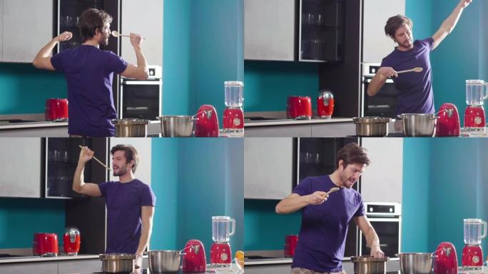 一个穿着睡衣的男人在厨房里唱歌跳舞，手里拿着勺子混合食物。