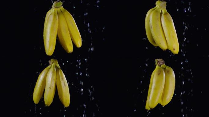漂水在香蕉上漂浮在黑色背景上
