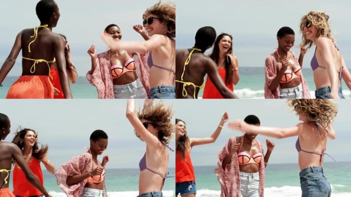 一群混血女性朋友在沙滩上一起跳舞4k