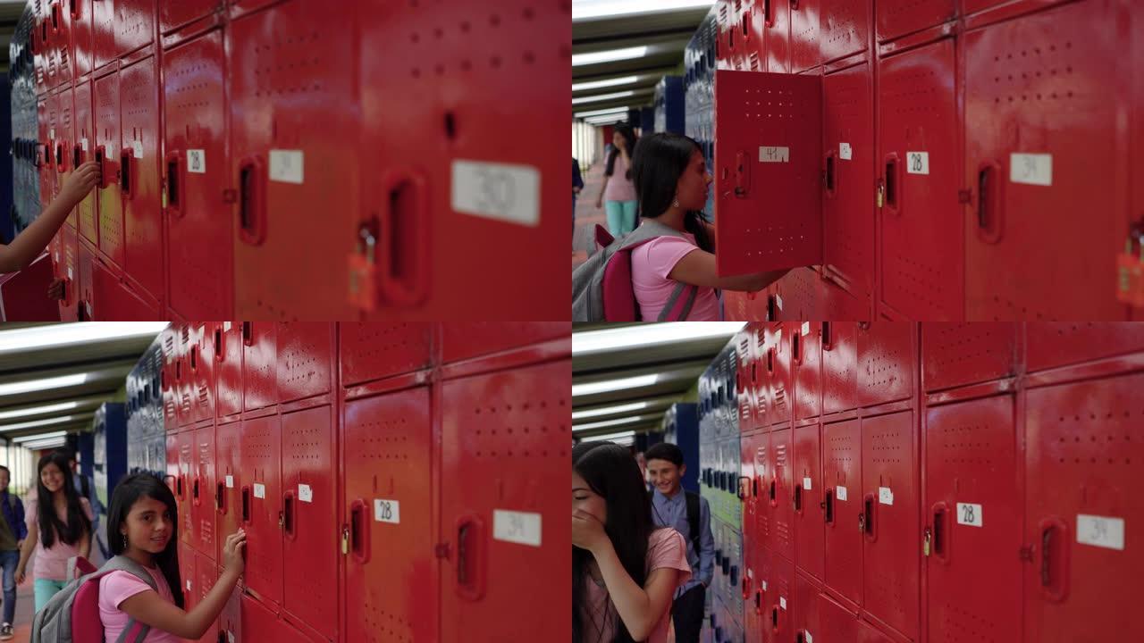 女中学生将笔记本放在储物柜中，而其他学生则走过