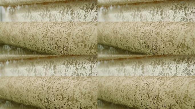 花边织物的宏观拍摄，用于为婚礼当天制作优雅的婚纱。